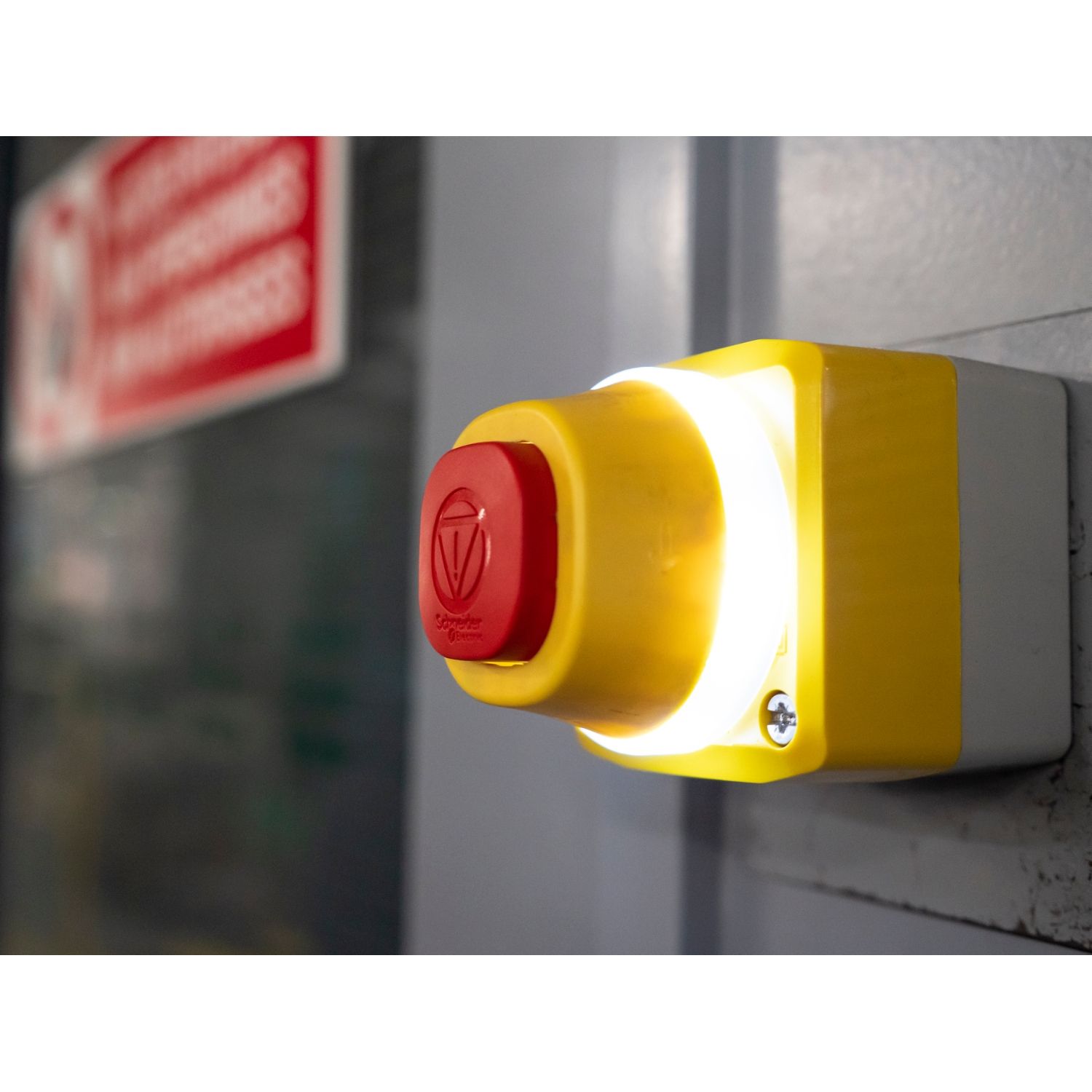 Picture of Complete control station, Harmony XALD, XALK, plastic, yellow lid, 1 illuminated emergency stop, white red fixed, turn to release, 1NO 2NC, 24V AC DC